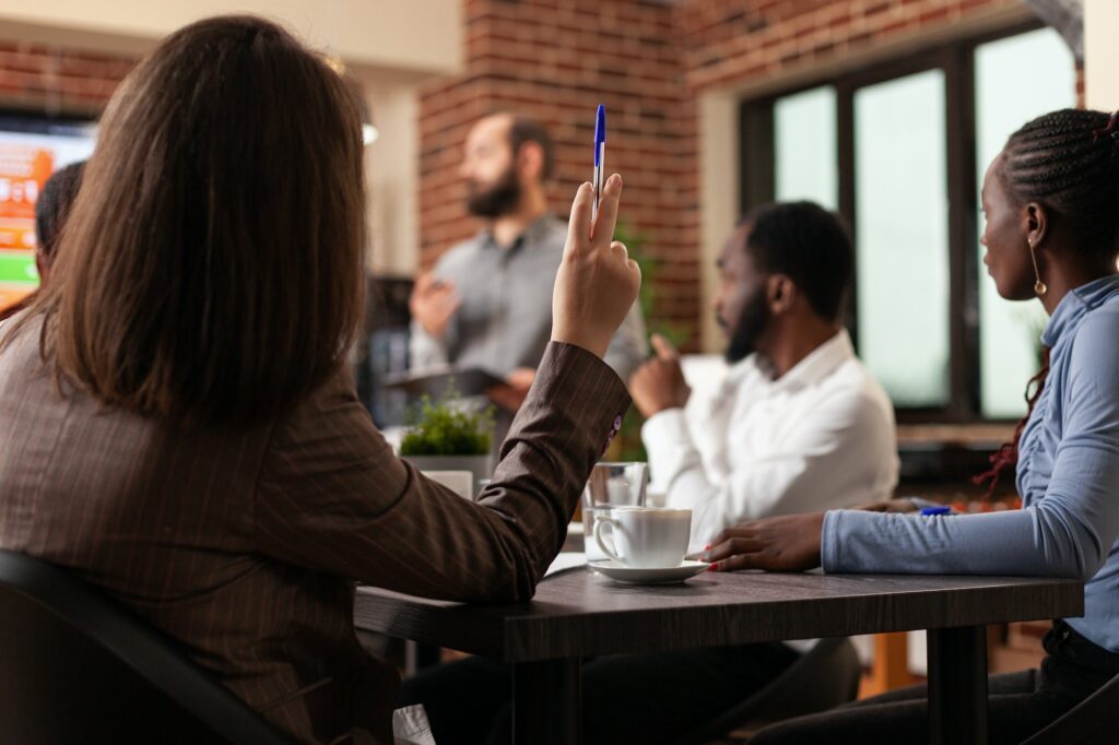 Diverse businesspeople working at management presentation